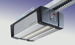 Garador Garamat 10 garage door opener with control panel on a light gray background